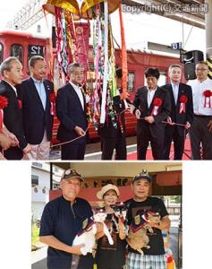 ㊤くす玉開花で５周年を祝う半井社長（左から３人目）ら＝松山駅＝㊦伊予上灘駅の「犬の駅長」と「猫の福駅長」（ともにＪＲ四国提供）