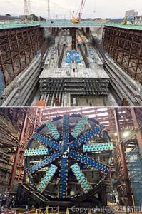 ㊤神奈川県駅（仮称）の全景。島式ホーム２面４線と本線・副本線の位置などが分かるほど工事が進んでいる  ㊦組み立てが完了したシールドマシン「ススムさん」