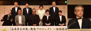 ㊧発表会に出席した倉坂社長（後列左端）ら関係者㊨あいさつする倉坂社長
